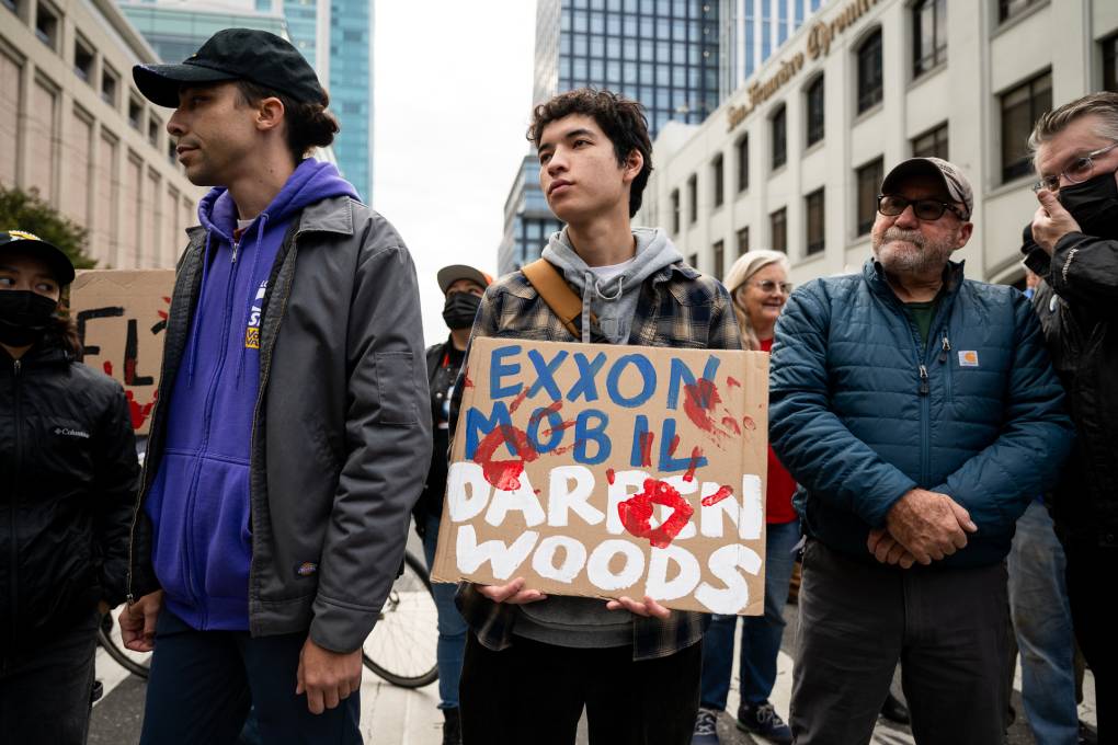 A protester carries a sign.